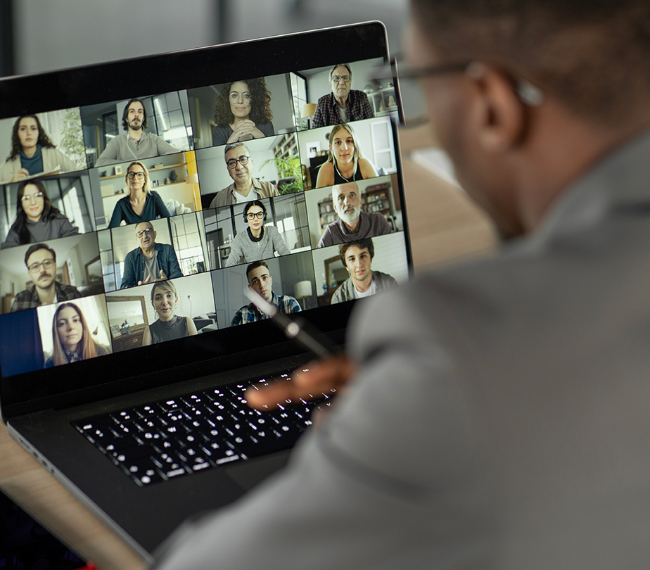man on computer meeting